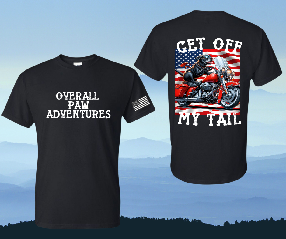 Black T-shirt with Overall Paw Adventures written in white on the front and Get off my tail with a dog black with goggles riding a motorcycle with a flag behind the pup. 