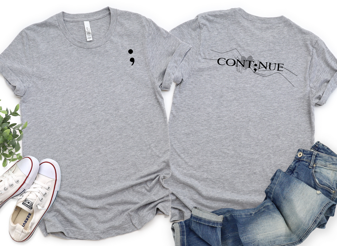 Continue - Front Left Pocket and Back Print Unisex T-Shirt (Boutique)